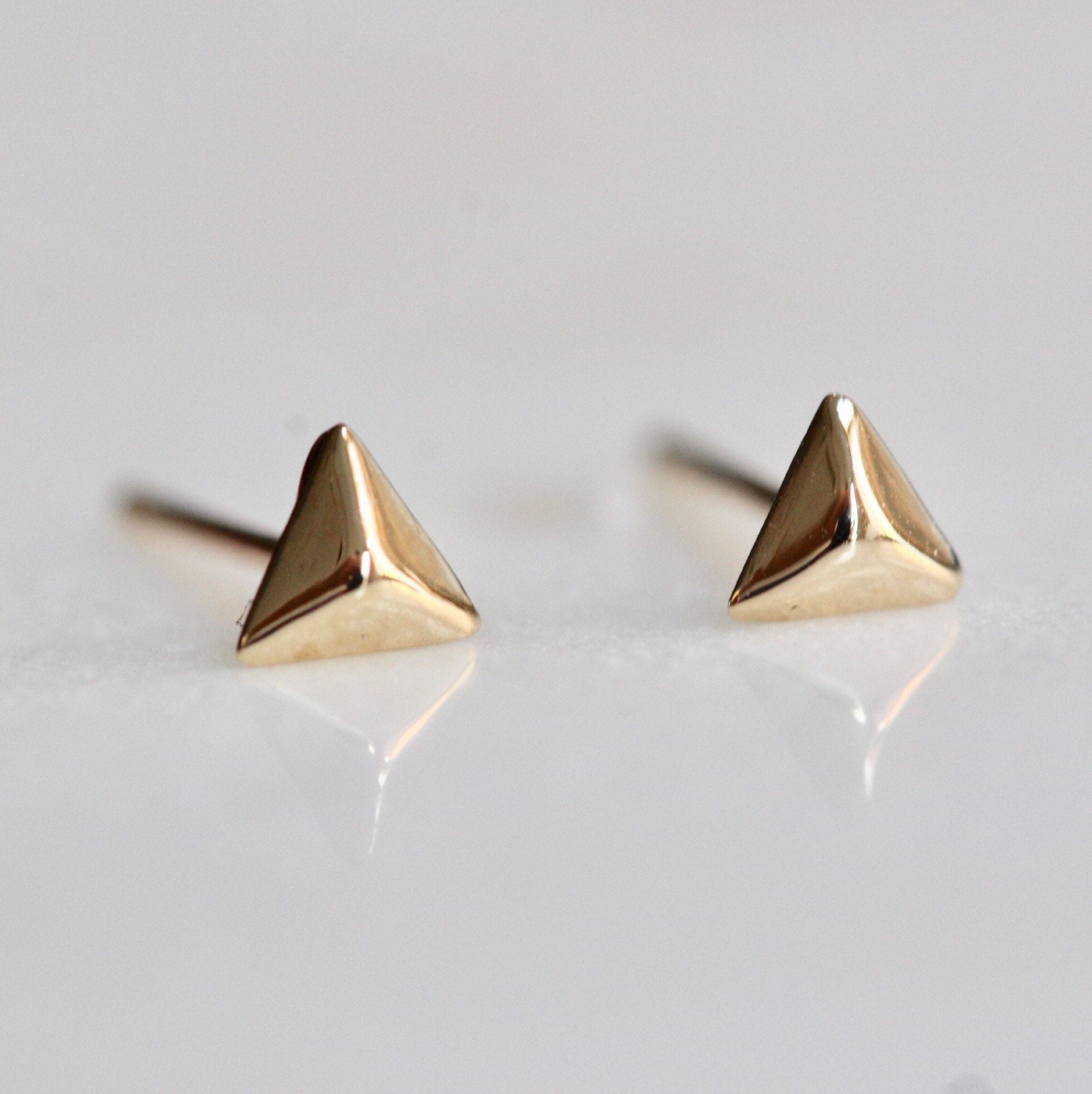 essentia pyramid studs