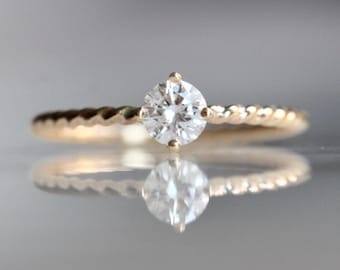 14K Gold Diamond Solitaire "Twist" Engagement Ring