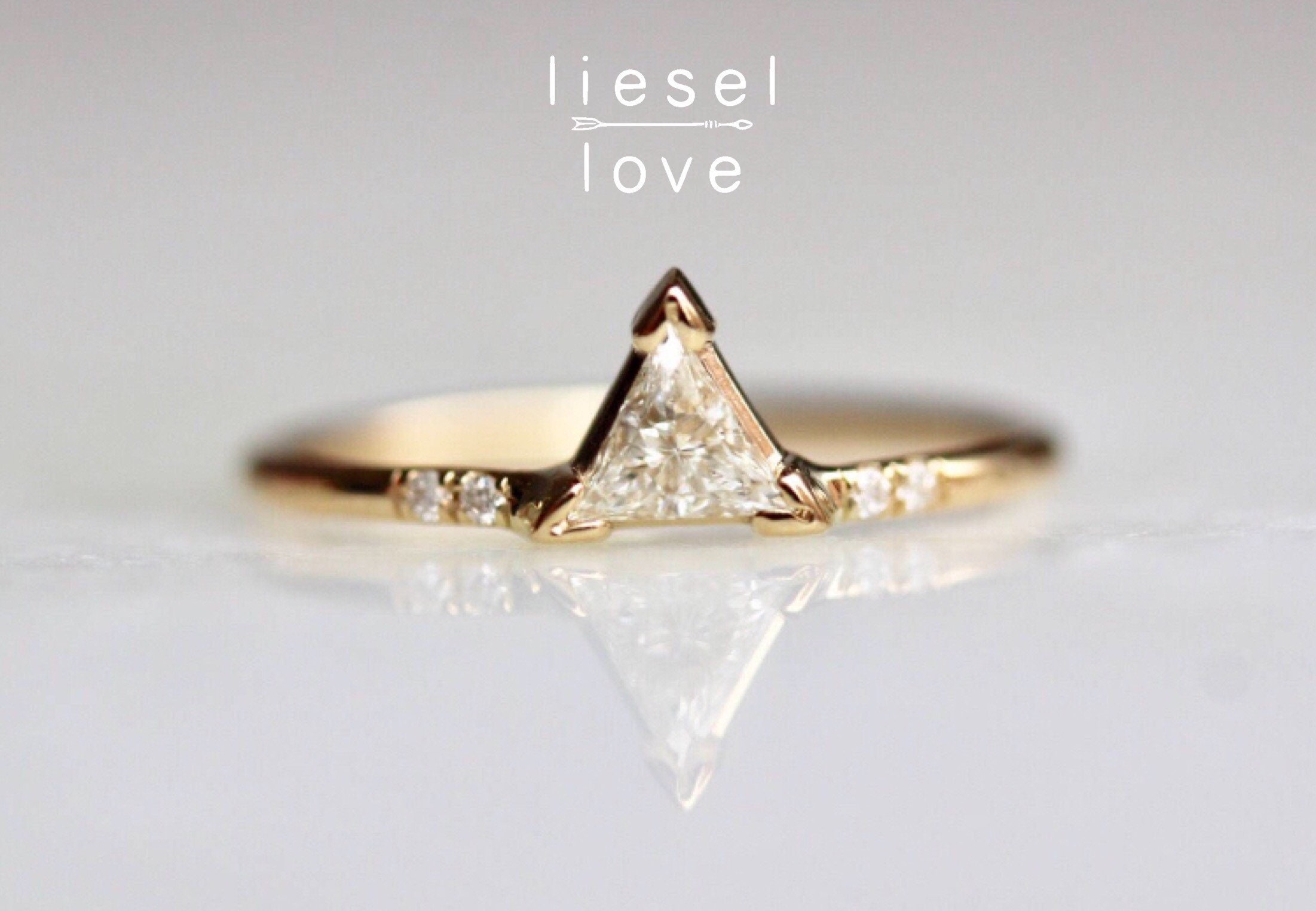 Gold triangle ring best sale