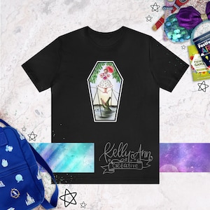 Doomed Tightrope Walker Girl in Coffin Frame - Bella+Canvas 3001 Short Sleeve T-shirt