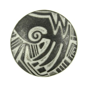 May include: A round, black and white ceramic dish with a geometric design. The design features a spiral and other abstract shapes.