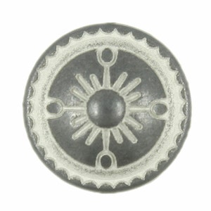 May include: A round, gray shield with a white border and a white sunburst design in the center.
