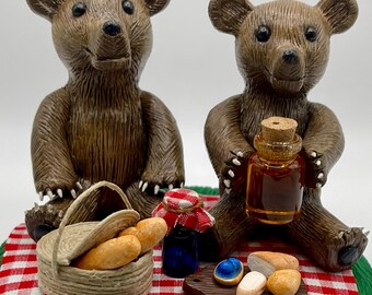 Handmade polymer clay brown bear couple having a picnic