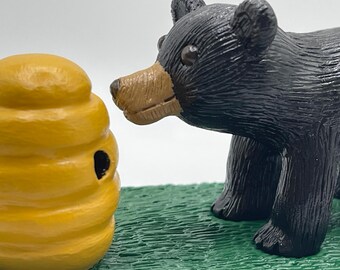 Handmade clay black bear with beehive