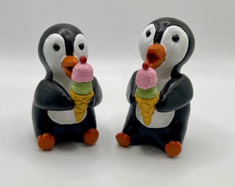 Polymer clay penguins eating ice cream