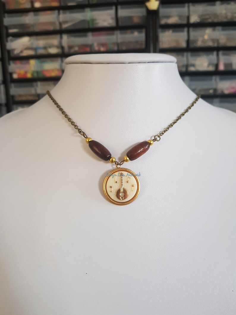 Wooden Beads and Gold Beads Porcelain /& Brass Banjo Ukelele Mandolin Cabochon Necklace on Bronze Crossed Chain Vintage 60s Cameo Cabochon