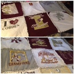 May include: A patchwork quilt made from t-shirts with various designs and text, including "I heart Cobden", "State Champions", and "Appleknockers".