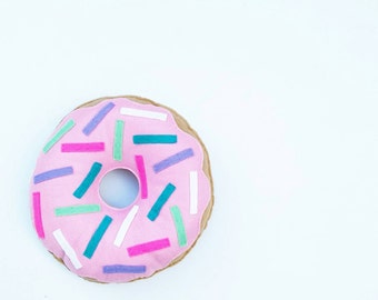 DARK PINK donut cushion with multi coloured sprinkles