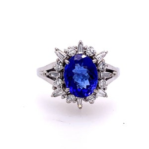 Platinum Round, Baguettes Diamonds & Fine Oval 2.1 Ct Tanzanite Ring
