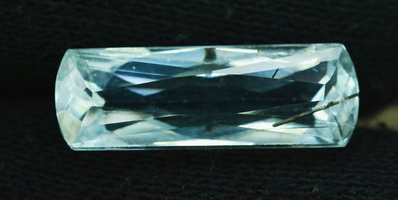 14.95 cts Flawless Untreated Aquamarine Gemstone with tourmaline inclusions from Pakistan 25*8*7 mm