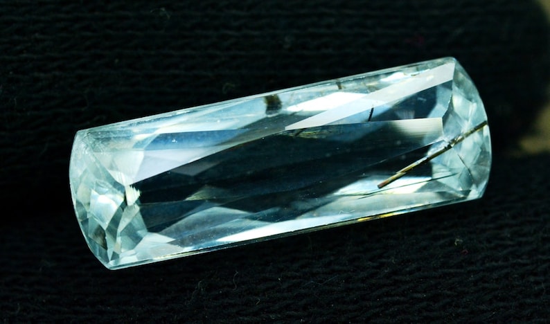 14.95 cts Flawless Untreated Aquamarine Gemstone with tourmaline inclusions from Pakistan 25*8*7 mm