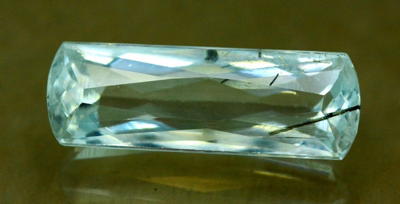 14.95 cts Flawless Untreated Aquamarine Gemstone with tourmaline inclusions from Pakistan 25*8*7 mm