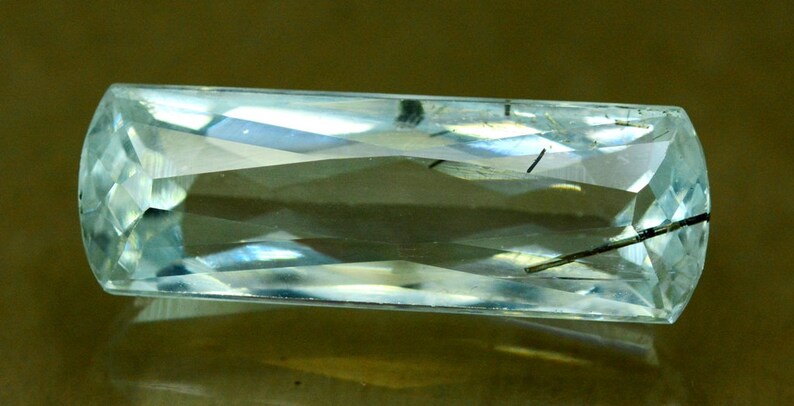 14.95 cts Flawless Untreated Aquamarine Gemstone with tourmaline inclusions from Pakistan 25*8*7 mm