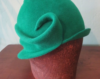 Hand-blocked freeform women's cloche hat in green fur felt