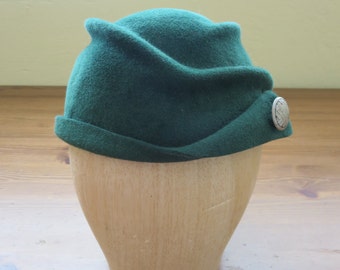 Hand-blocked freeform women's hat in green fur felt