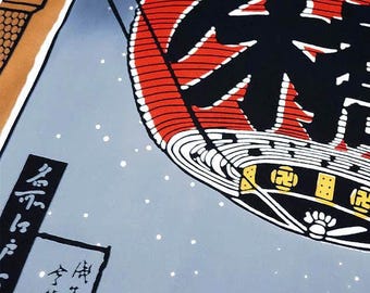 Puede incluir: Primer plano de una ilustración de estilo japonés con una gran linterna roja y negra con caracteres japoneses. El fondo es azul claro con puntos blancos, y hay una pequeña sección de un edificio en la esquina superior izquierda.