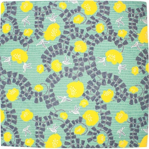 May include: Square textile with a repeating pattern of yellow flowers, gray vines, and white birds on a light green background. The design is symmetrical and detailed, creating a visually appealing aesthetic.