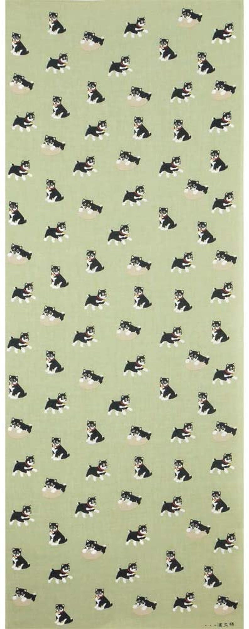 May include: A green fabric with a repeating pattern of black and white dogs. The dogs are in various poses, some are sitting, some are standing, and some are running. The fabric is a light green color and the dogs are a dark black color.