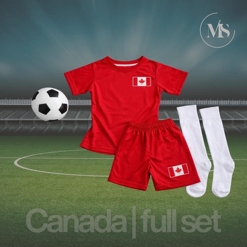 May include: A red soccer uniform set with the Canadian flag on the shirt and shorts, along with white socks and a soccer ball. The words "Canada | full set" are at the bottom of the image.