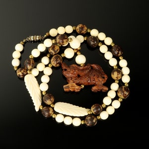 Foo Dog Pendant Beaded Necklace Carved Wood Brown Beige Beads