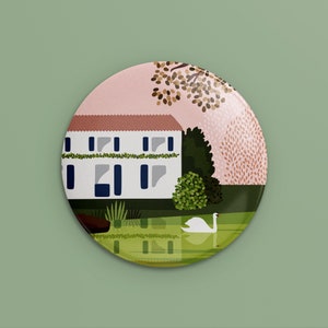 May include: A pink and green illustration of a house with a white swan swimming in a pond. The house has a red roof and white walls with blue windows. The pond is surrounded by green trees and bushes.