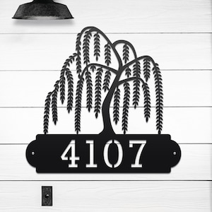 Weeping Willow House Numbers Plaque shown in Black with Example Street Numbers on Exterior House Wall