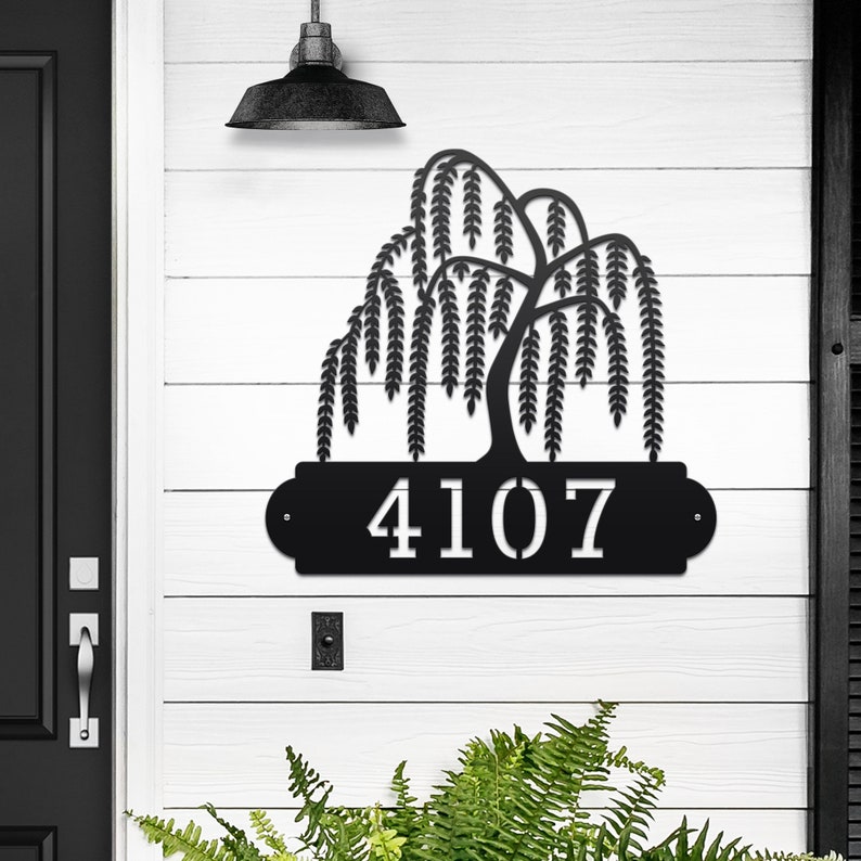 Weeping Willow House Numbers Plaque shown in Black with Example Street Numbers on Exterior House Wall