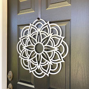 Right Angle View - Metal Geometric Mandala Door Wreath shown in Satin Silver on Black Front Door