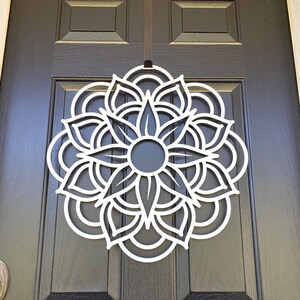 Lower Angle View - Metal Geometric Mandala Door Wreath shown in Satin Silver on Black Front Door