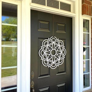Left Angle View - Metal Geometric Mandala Door Wreath shown in Satin Silver on Black Front Door