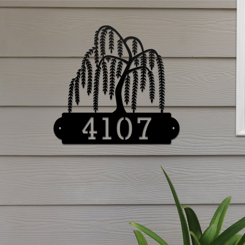 Weeping Willow House Numbers Plaque shown in Black with Example Street Numbers on Tan Exterior House Wall