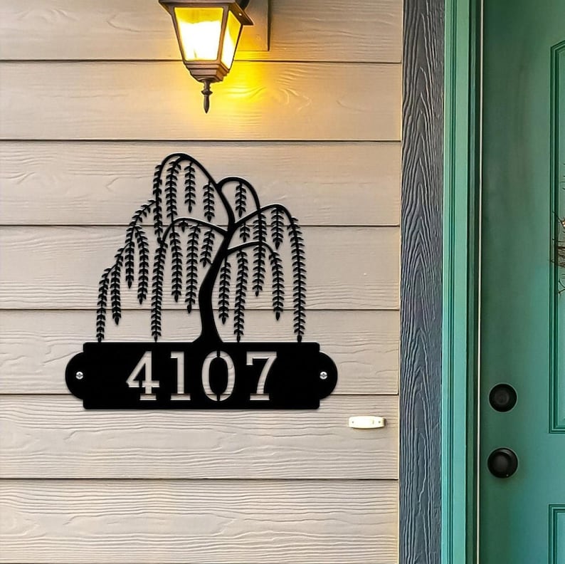 Weeping Willow House Numbers Plaque shown in Black with Example Street Numbers on Exterior House Wall