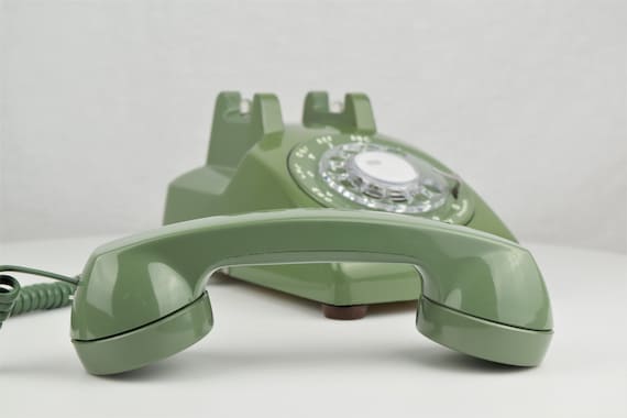 teléfono fijo vintage color crema foto de Stock