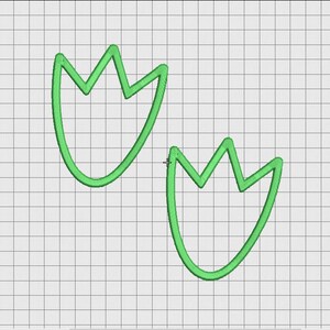 May include: Two green tulip-shaped designs on a grid background. Each design has a curved base and three pointed segments at the top, resembling a tulip or a stylized footprint. The lines are smooth and consistent.