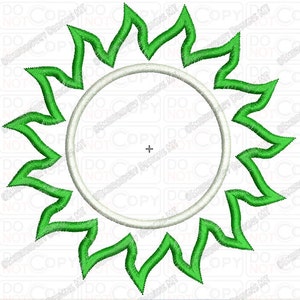 May include: An embroidered design featuring a white circle surrounded by green, flame-like shapes. The design is on a white background and appears to be a digital embroidery file. The text "DO NOT COPY" is visible around the edges.