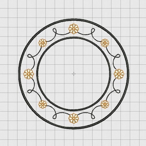 May include: A black circular frame with a decorative border of small gold flowers and swirls.