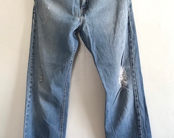 Vintage Levis 505, repaired Levis, distressed denim, ultra high rise, 90’s Levis jeans, 30”, made in USA, red tabs, medium wash, high waist