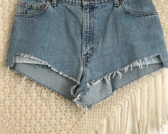 Waist 33"-34" vintage Levis cutoffs, high rise jeans, jean cutoffs, jean shorts, festival fashion, free people like, hippie shorts, bohemian