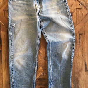 1990’s, Y2K, vintage Levi’s jeans, distressed, orange tabs, well worn, faded, raw cropped edge, W34, 34”, Levis 505 jeans, high rise, waist