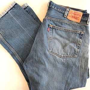 Y2K, Levi’s 501 jeans, W36 L28, short cuffed inseam, well worn, faded Levis jeans, red tab Levi’s jeans, hype, boyfriend jeans, distressed,