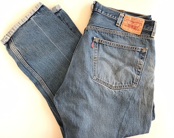 Y2K, Levi’s 501 jeans, W36 L28, short cuffed inseam, well worn, faded Levis jeans, red tab Levi’s jeans, hype, boyfriend jeans, distressed,