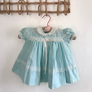 1950s, 1960s, baby girls dress, 6 months, 9 months, baby blue ruffle dress, lace dress, retro newborn dress, puffy sleeves, eyelet details image 1