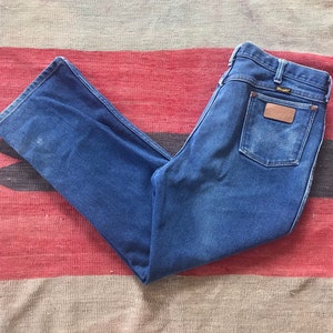 Vintage wrangler denim, wrangler jeans, cowboy jeans, western wear, made in USA, vintage denim, vintage jeans, modern 37", poly cotton blend