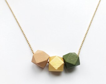 small wooden necklace geometric gold-colored