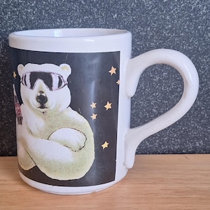 Coke cola heavy coffee cup with polar bear