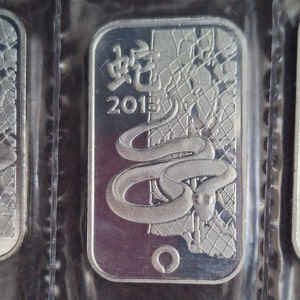 1 Troy oz. .999 year of the snake, silver art bar