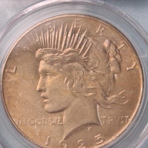 1925 PCGS, MS63 Silver Peace Dollar