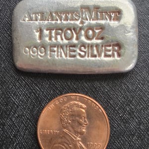 1 OZ. Silver hand poured Bar, one of a kind