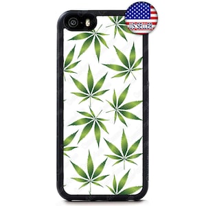 May include: Black smartphone case featuring a pattern of green cannabis leaves on a white background. The case has a black border and a camera lens opening. A "US SELLER" sticker is visible.