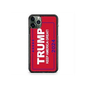 May include: A black phone case with a red background and white text that says "TRUMP" and "KEEP AMERICA GREAT!" with blue stars and the number "2024" in blue.